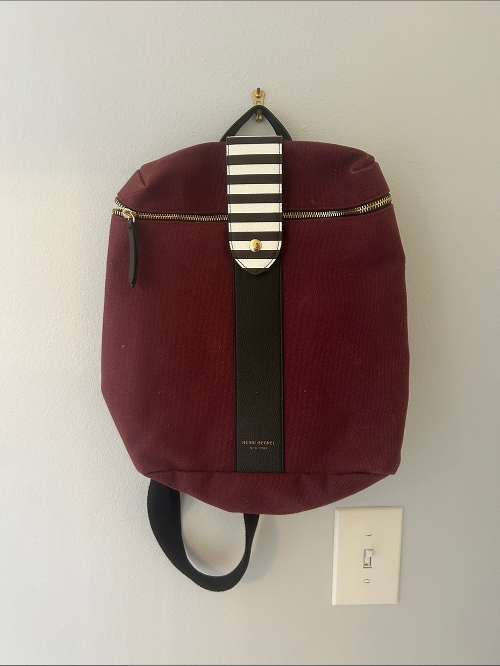 Henri Bendel Burgundy Canvas Backpack with Black Trim and Striped Tab